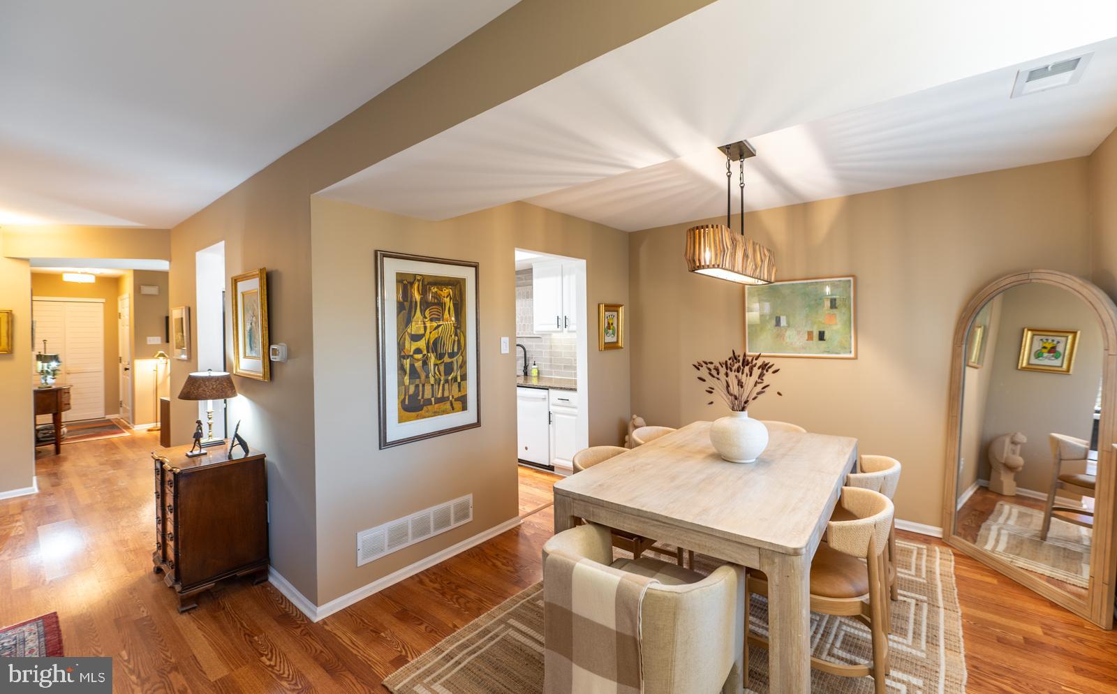 204 Camsten Court Chesterbrook, PA 19087 - Photo 16 of 56 a view of a dining room with furniture and wooden floor