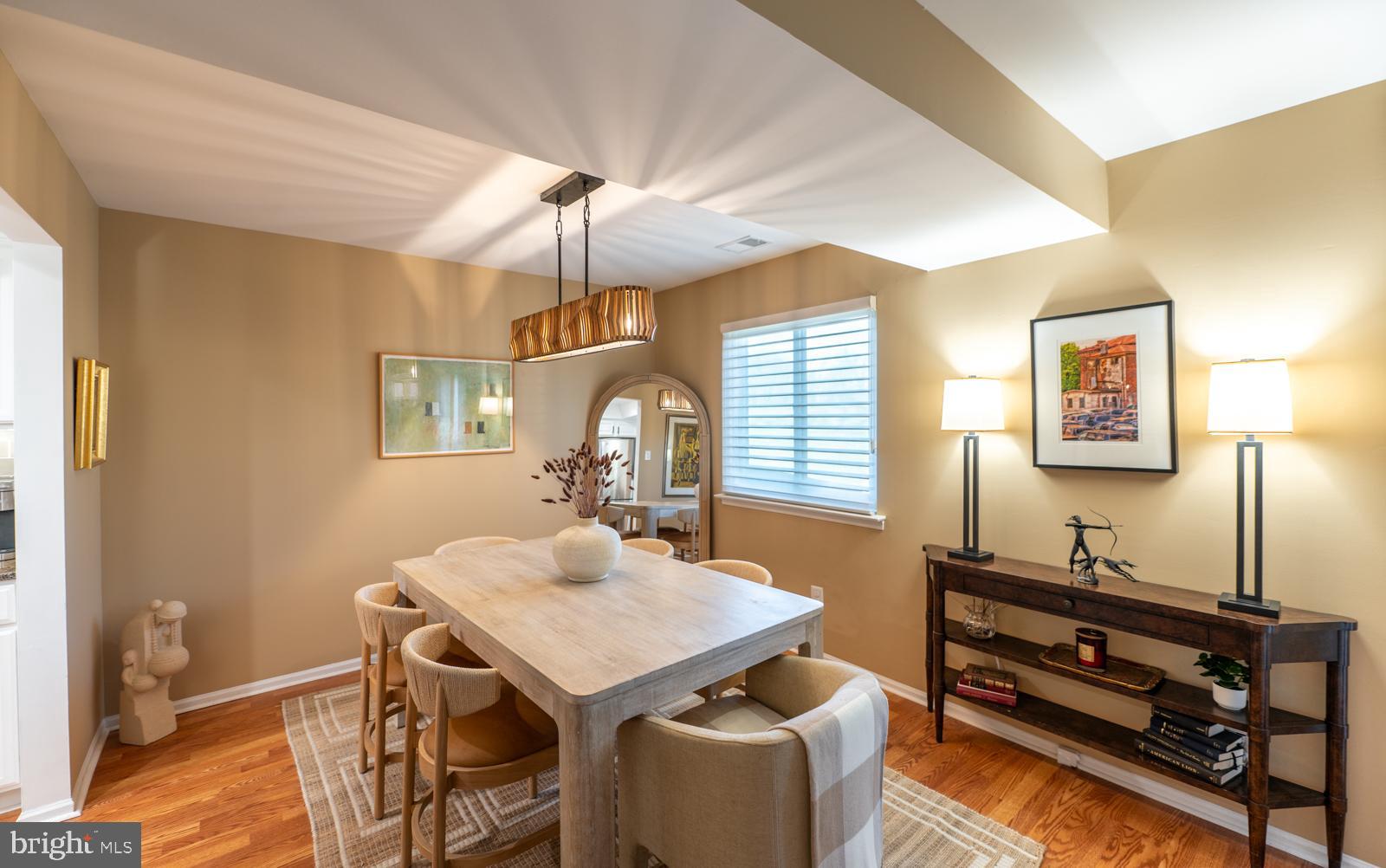 204 Camsten Court Chesterbrook, PA 19087 - Photo 17 of 56 a view of a dining room with furniture and wooden floor