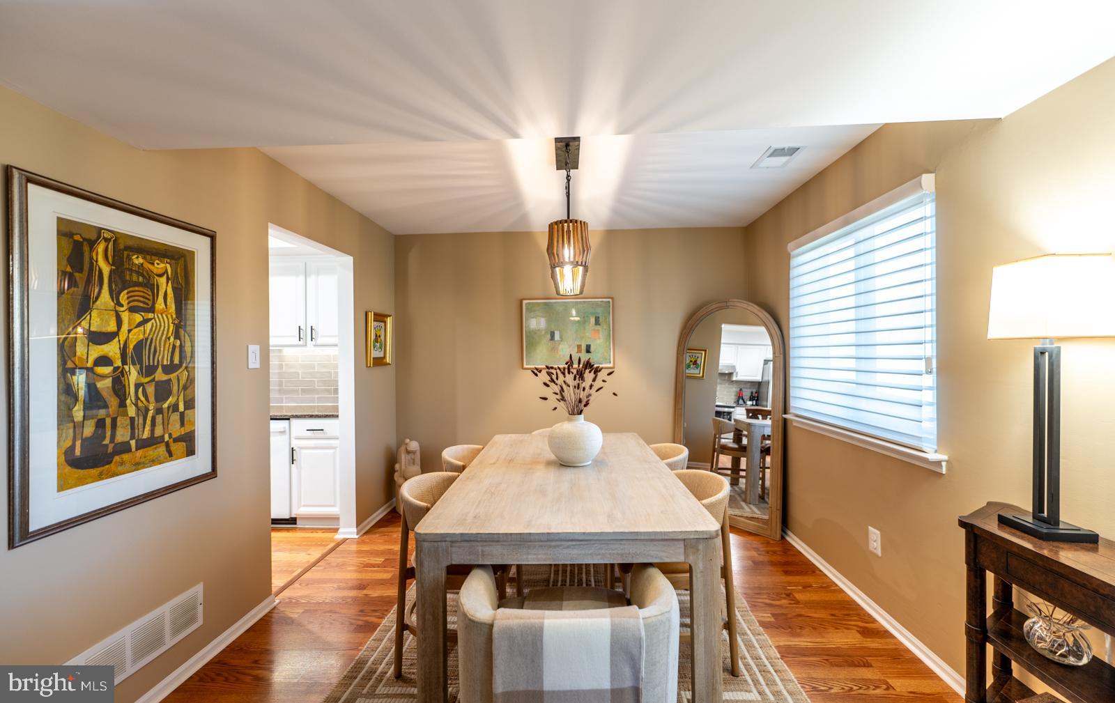 204 Camsten Court Chesterbrook, PA 19087 - Photo 18 of 56 a view of a dining room with furniture and a chandelier