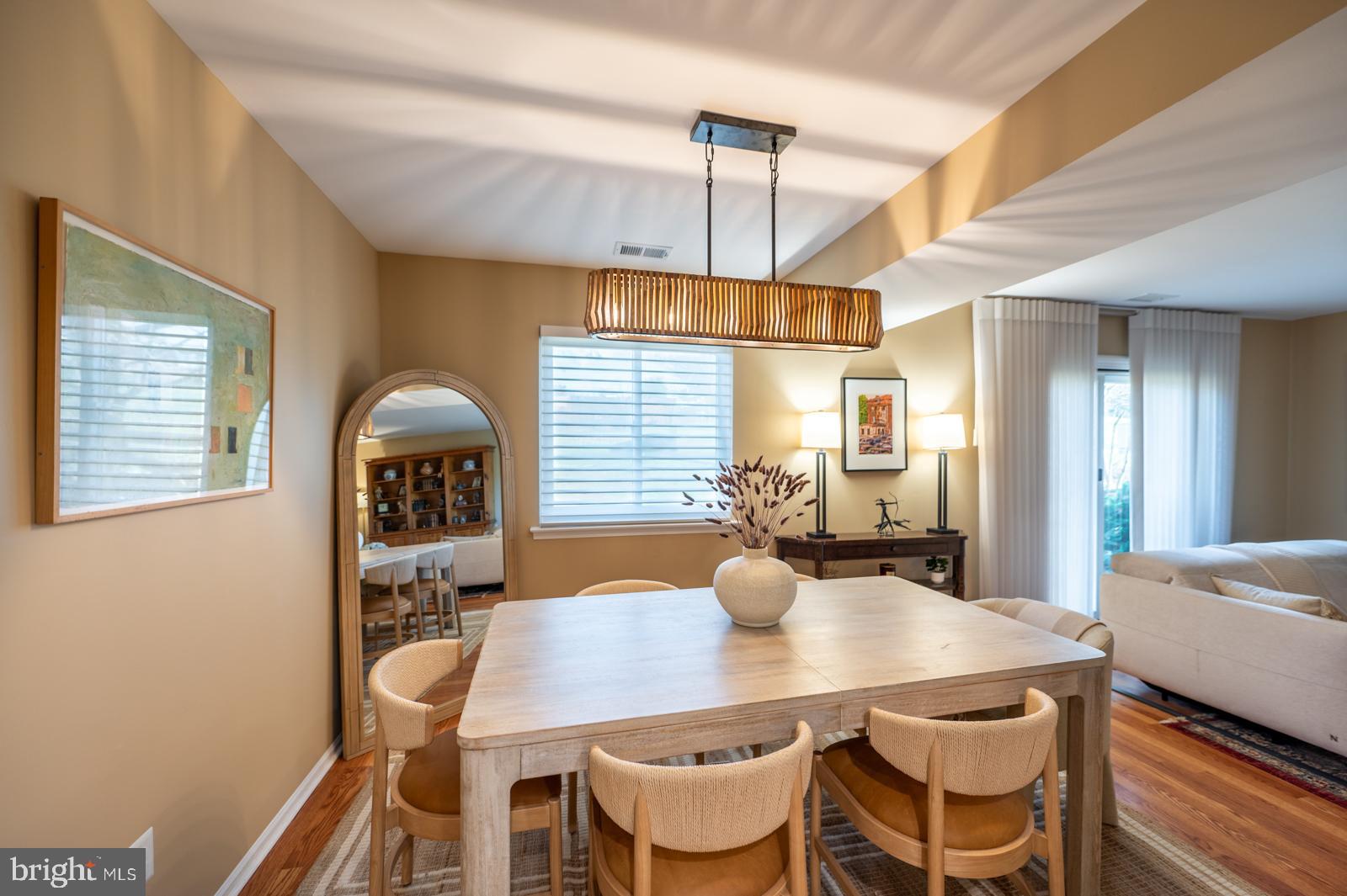 204 Camsten Court Chesterbrook, PA 19087 - Photo 19 of 56 a view of a dining room with furniture and wooden floor