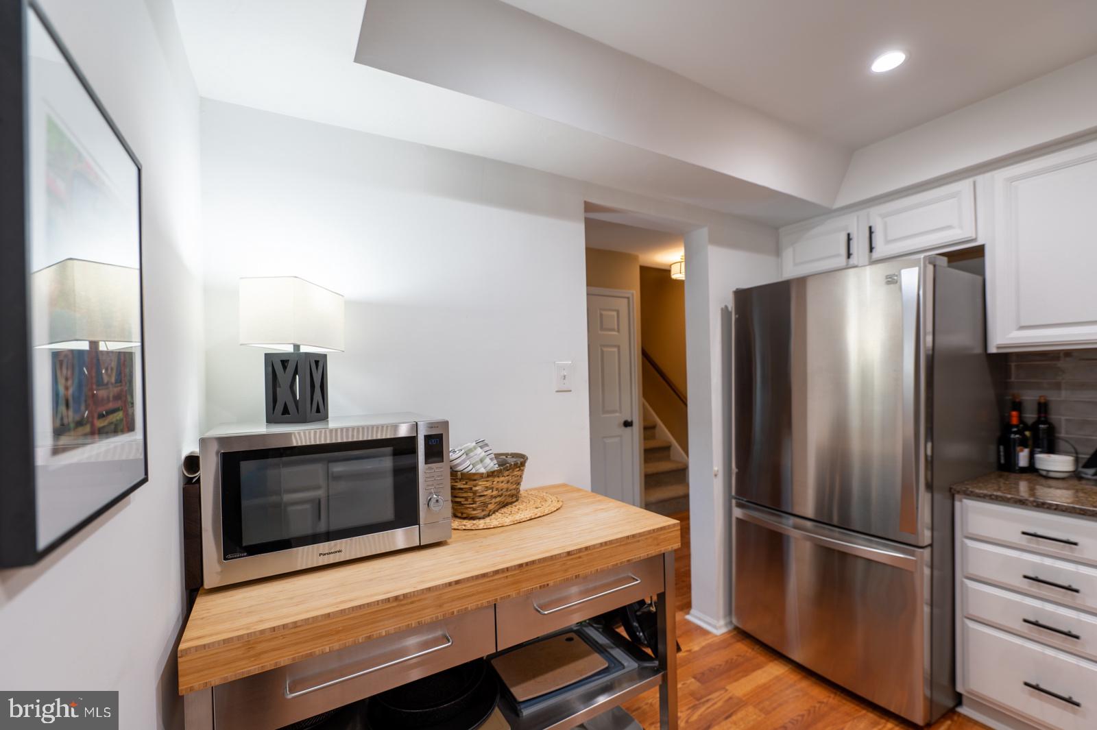 204 Camsten Court Chesterbrook, PA 19087 - Photo 23 of 56 a kitchen with a refrigerator and microwave