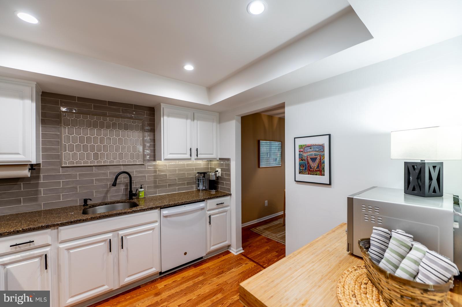 204 Camsten Court Chesterbrook, PA 19087 - Photo 26 of 56 a kitchen with a sink and cabinets