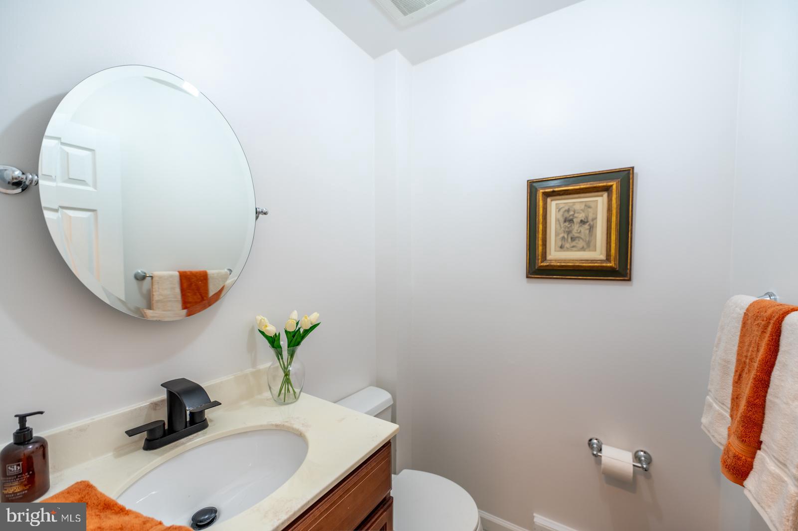 204 Camsten Court Chesterbrook, PA 19087 - Photo 29 of 56 a bathroom with a sink mirror and toilet