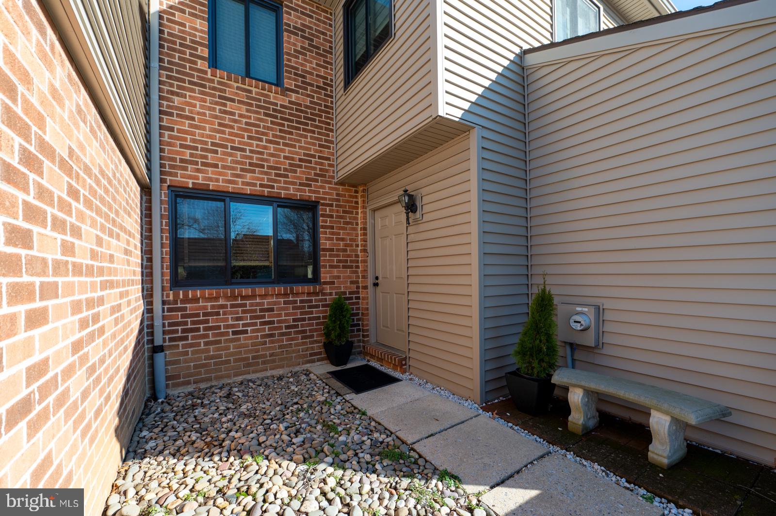 204 Camsten Court Chesterbrook, PA 19087 - Photo 3 of 56 a view of a pathway with a white house