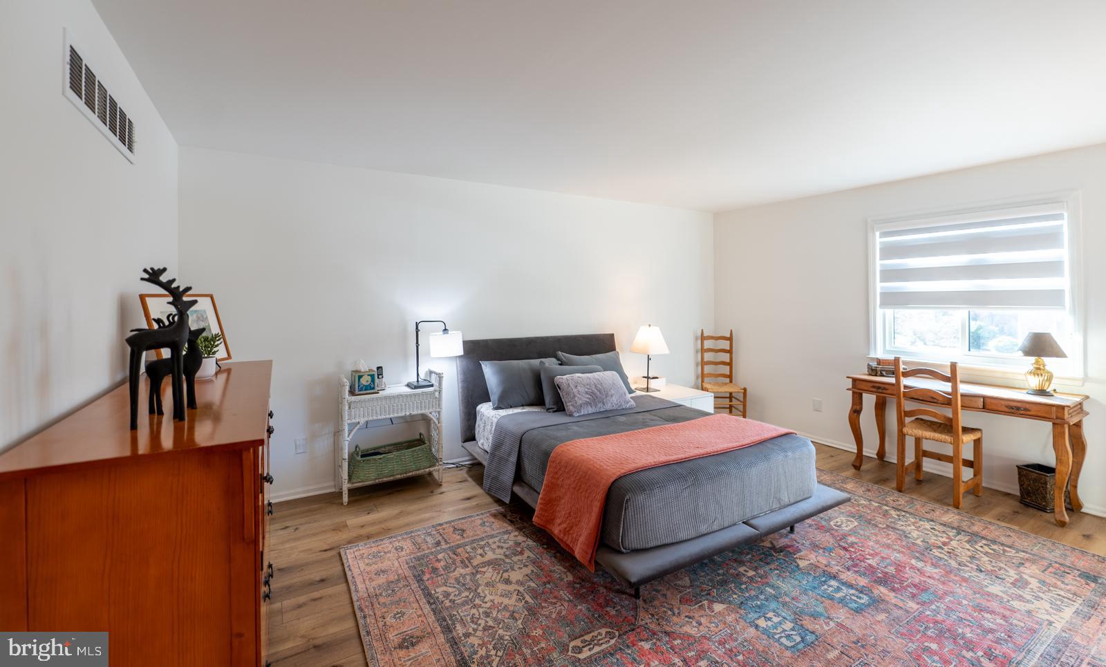 204 Camsten Court Chesterbrook, PA 19087 - Photo 33 of 56 a bed room with a bed and a table chair