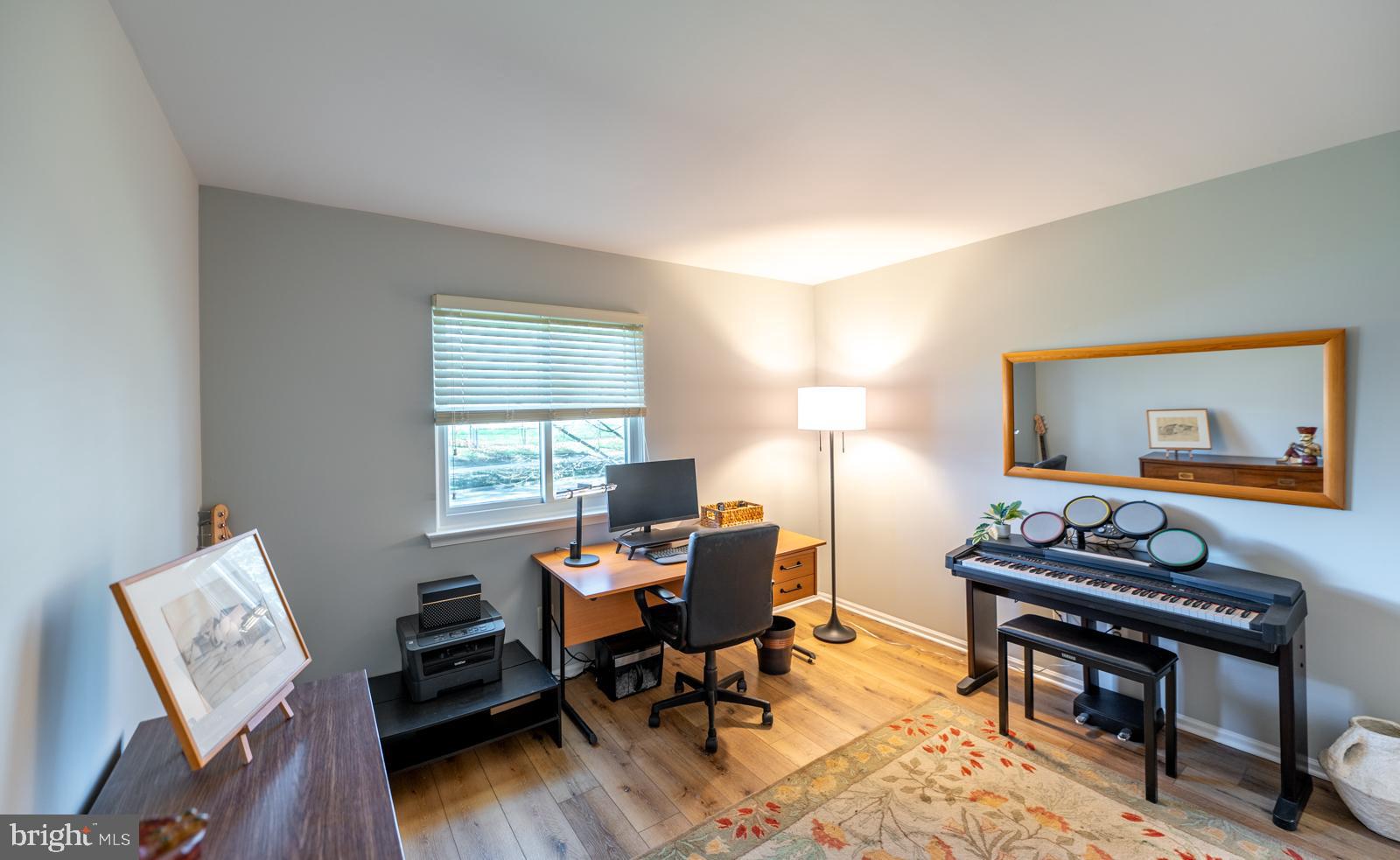 204 Camsten Court Chesterbrook, PA 19087 - Photo 45 of 56 a living room with furniture and a window