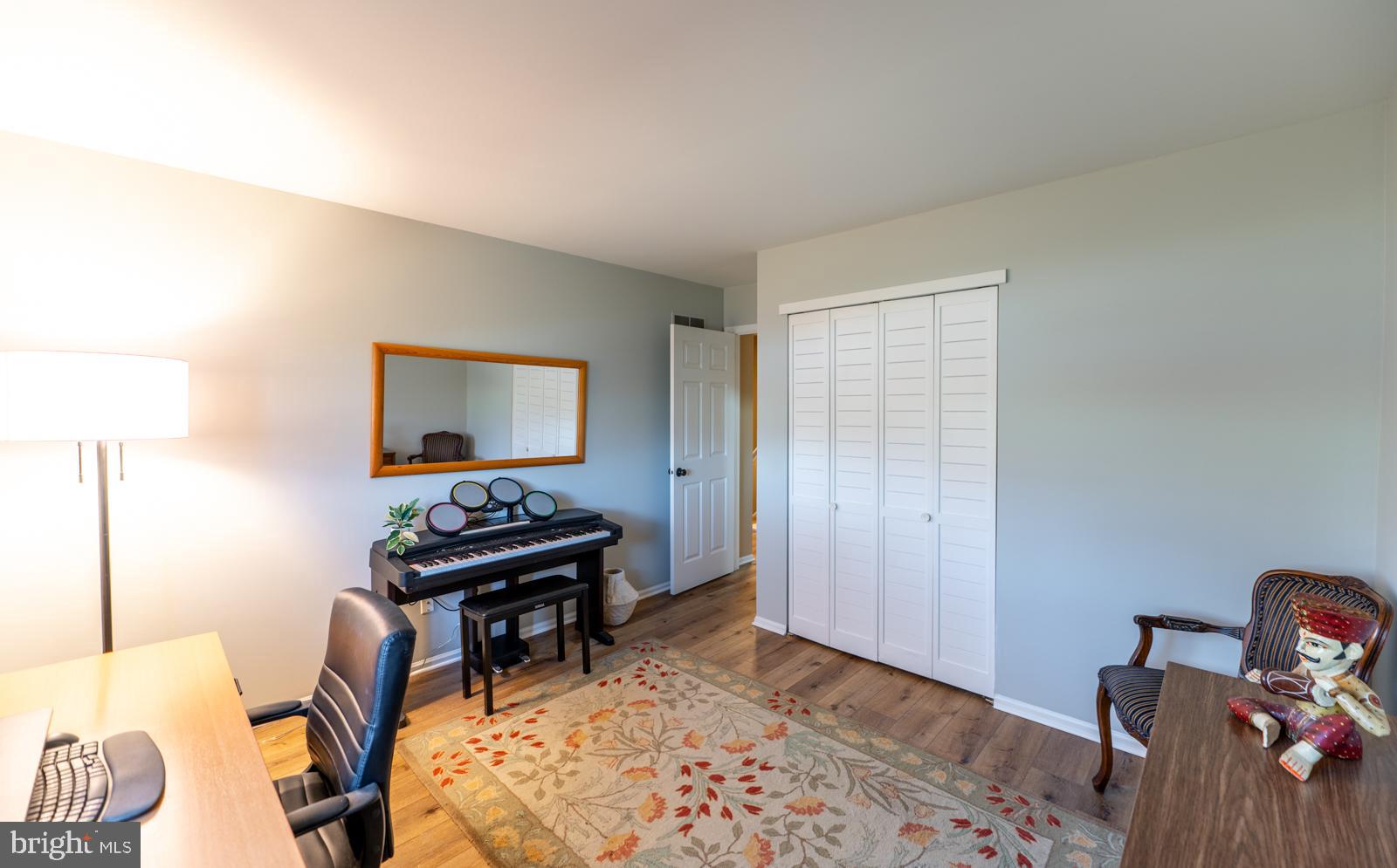 204 Camsten Court Chesterbrook, PA 19087 - Photo 47 of 56 a living room with furniture and a piano