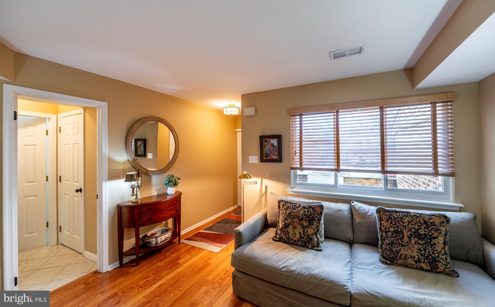 204 Camsten Court Chesterbrook, PA 19087 - Photo 9 of 56 a living room with furniture and a large window
