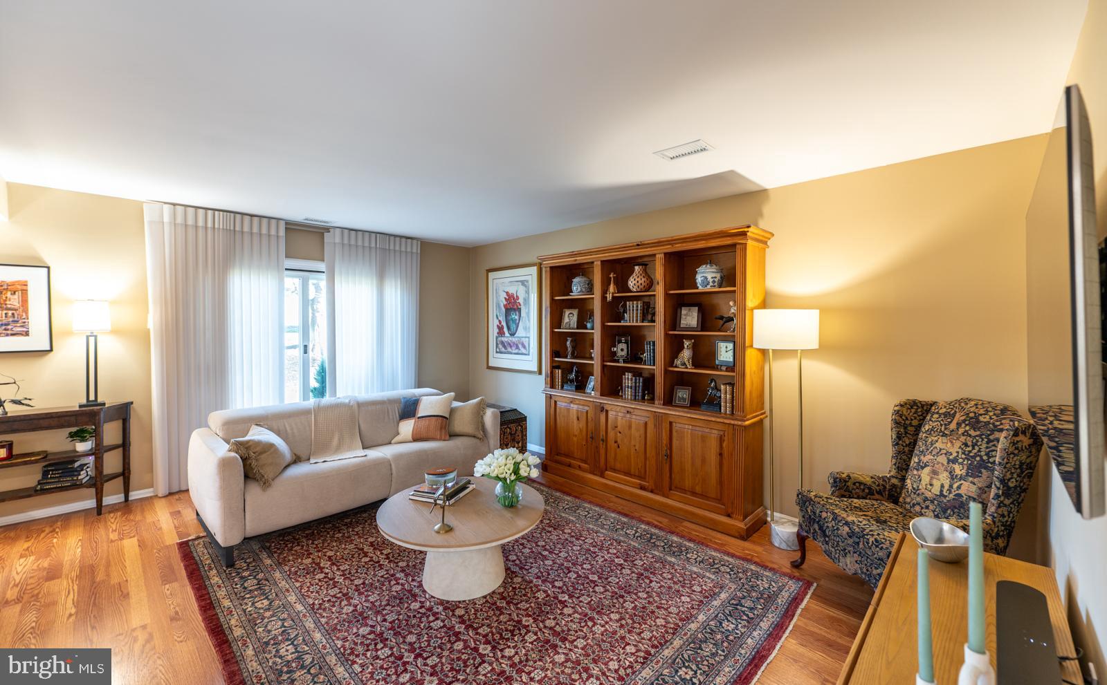 204 Camsten Court Chesterbrook, PA 19087 - Photo 10 of 56 a living room with furniture and a rug