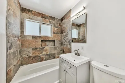 a bathroom with a sink and a bathtub