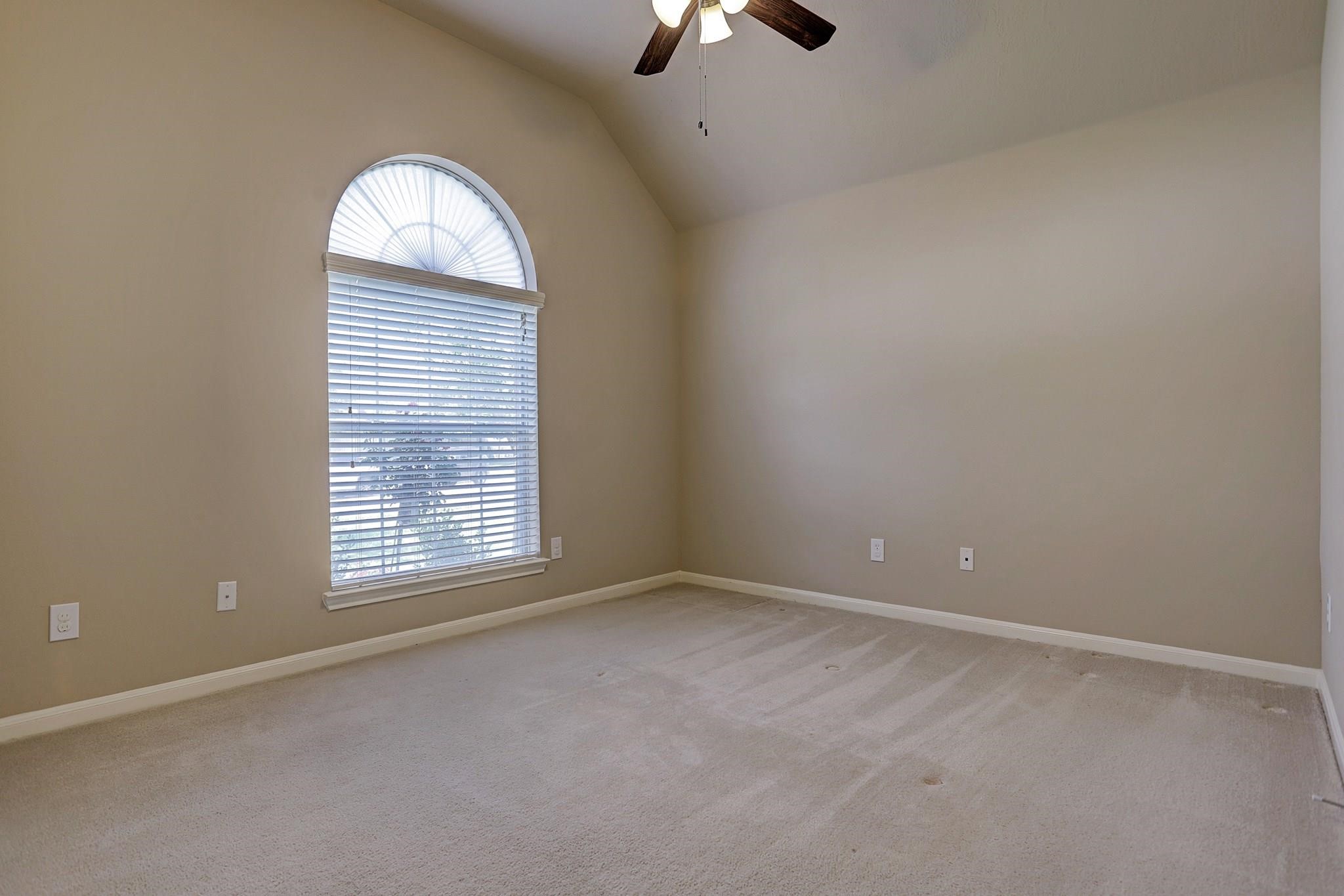 2118 Great Prairie Lane Katy, TX 77494 - Photo 19 of 24 an empty room with a window