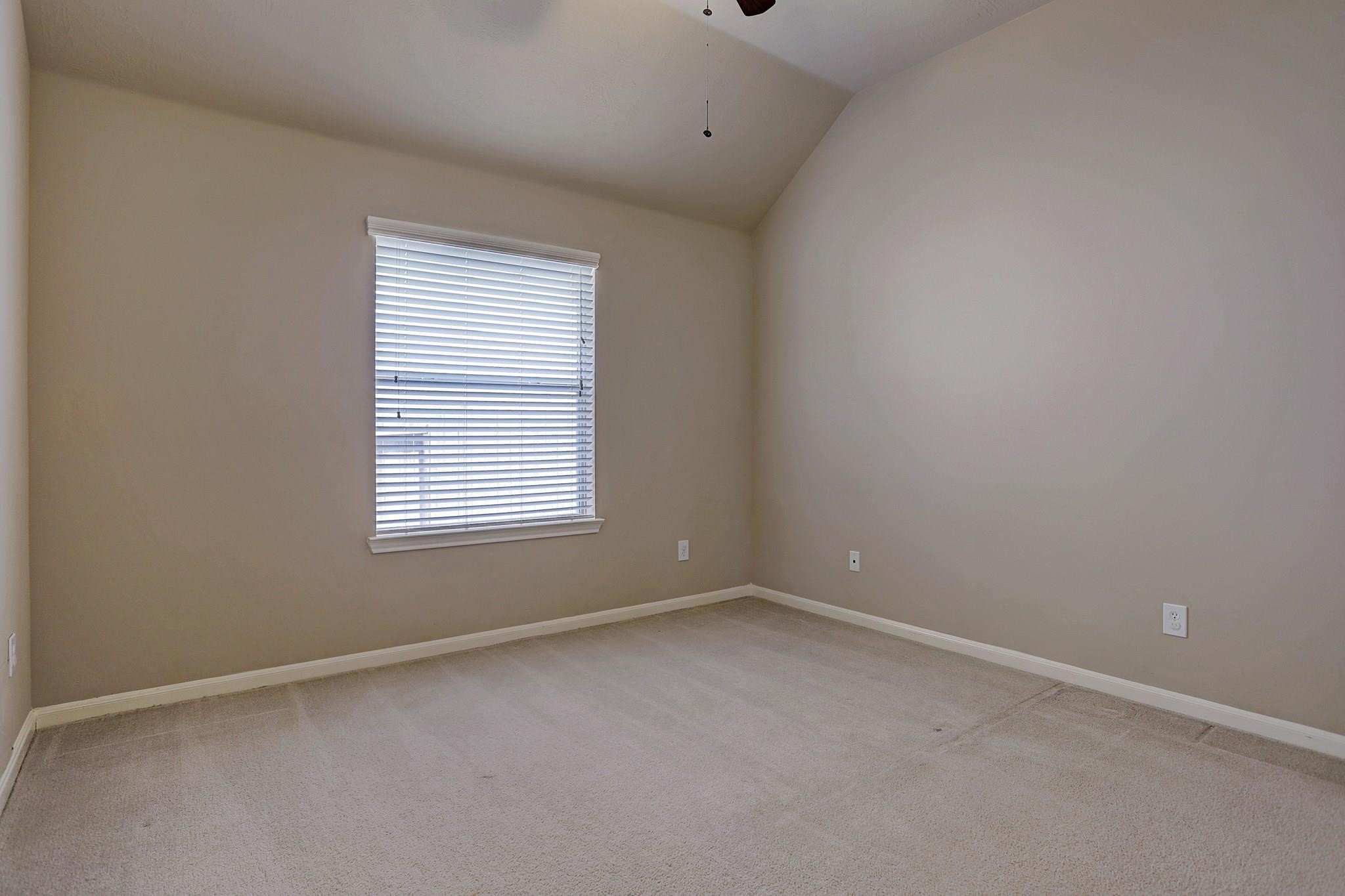 2118 Great Prairie Lane Katy, TX 77494 - Photo 20 of 24 an empty room with a window