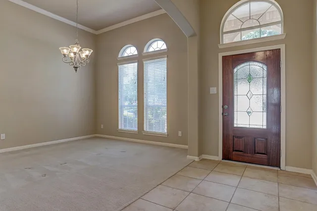 an empty room that has a window