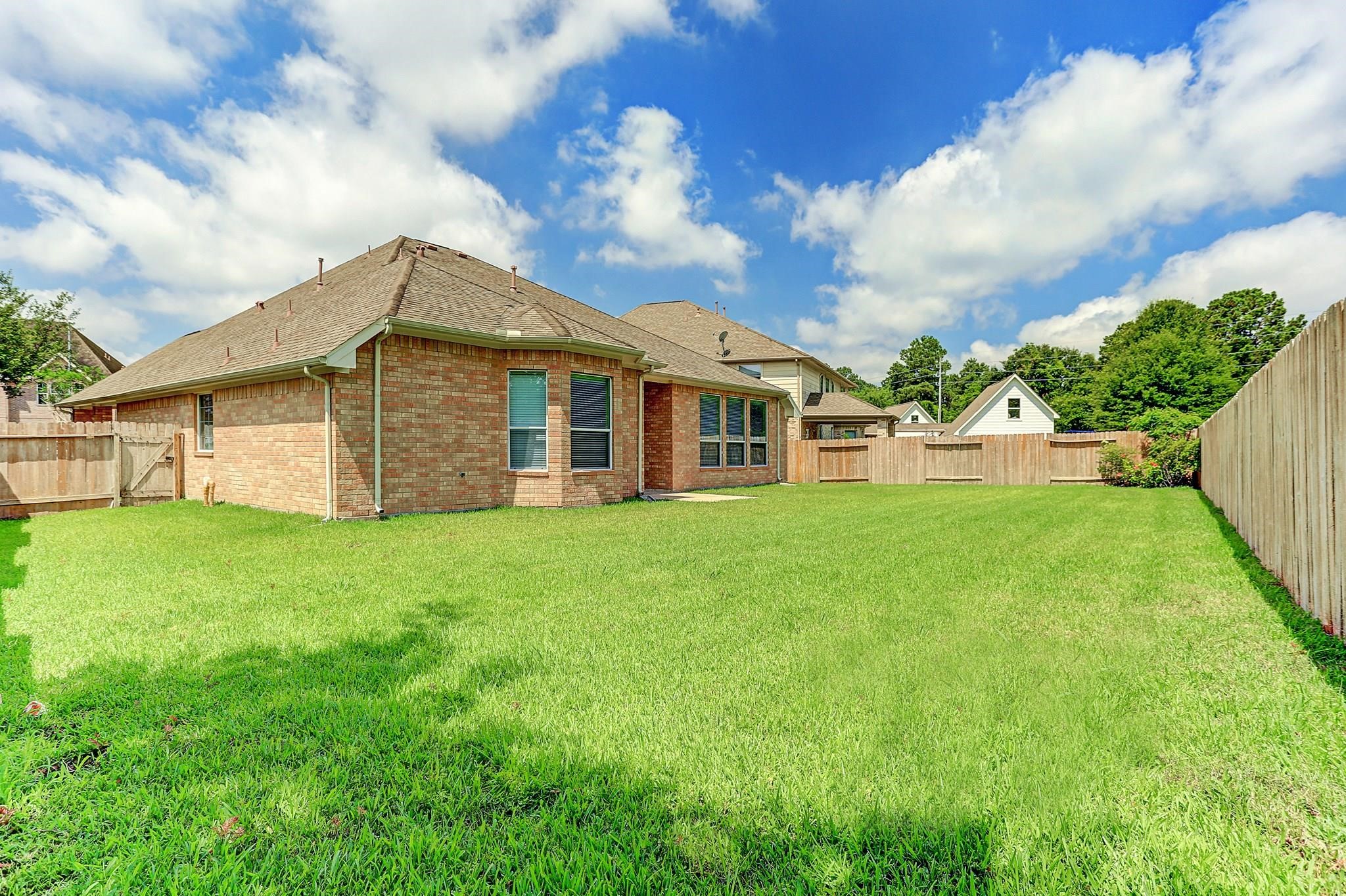2118 Great Prairie Lane Katy, TX 77494 - Photo 23 of 24 a view of a house with yard and porch