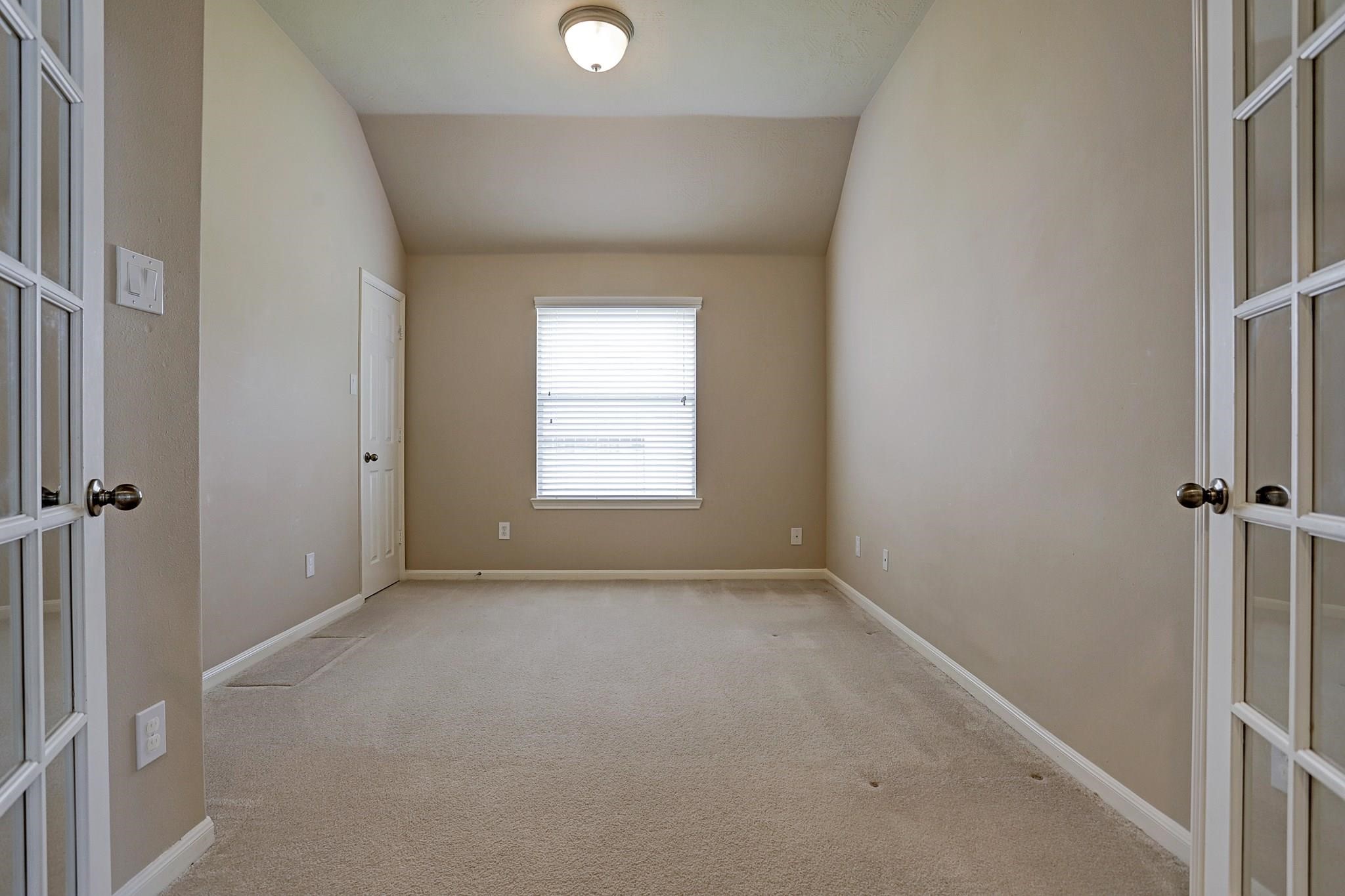 2118 Great Prairie Lane Katy, TX 77494 - Photo 5 of 24 a view of an empty room with a window