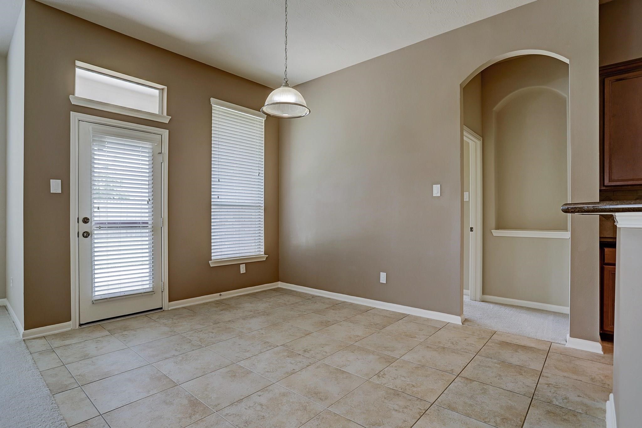 2118 Great Prairie Lane Katy, TX 77494 - Photo 9 of 24 a view of an empty room with a window
