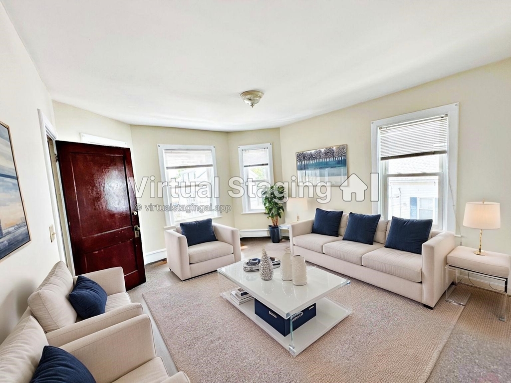 528 Lawton Street, Unit 3 Fall River, MA 02721 - Photo 11 of 22 a living room with furniture rug and window