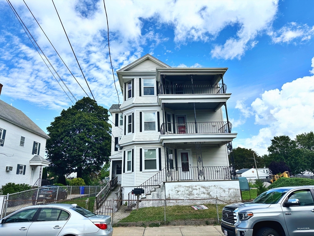 528 Lawton Street, Unit 3 Fall River, MA 02721 - Photo 2 of 22 a front view of a house with garden
