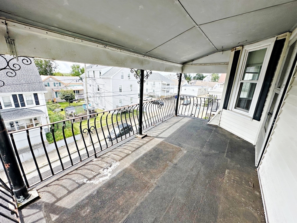 528 Lawton Street, Unit 3 Fall River, MA 02721 - Photo 21 of 22 a view of a porch with furniture
