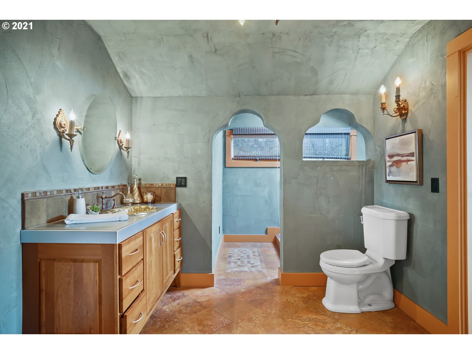 3748 Southwest Patton Road Portland, OR 97221 - Photo 22 of 32 a bathroom with a toilet sink and mirror