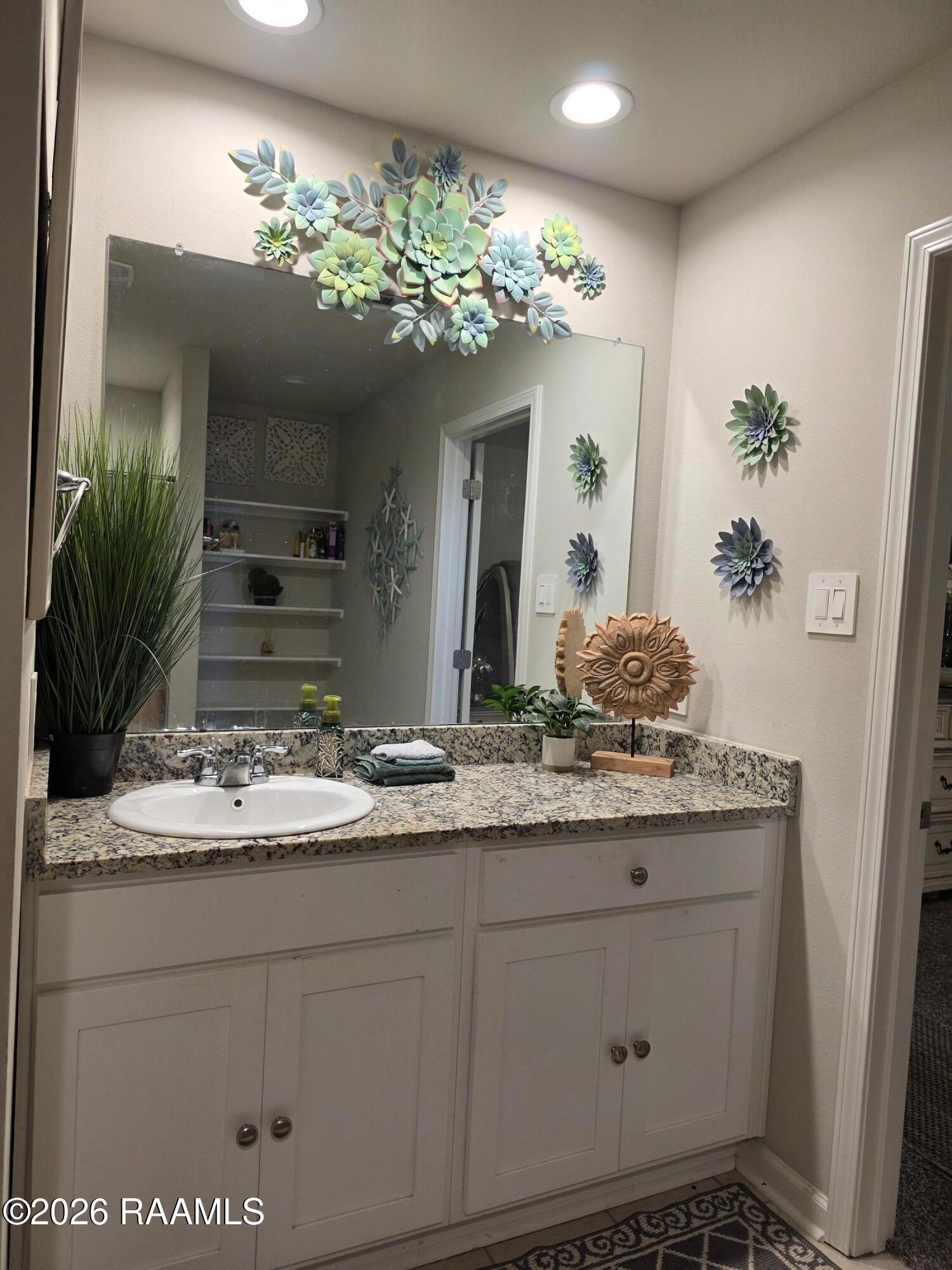 4056 Starling Place Jennings, LA 70546 - Photo 11 of 19 Primary Bath Vanity