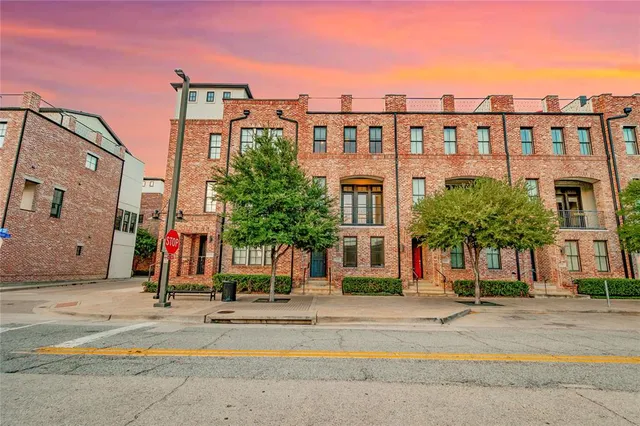 a view of a building with a street