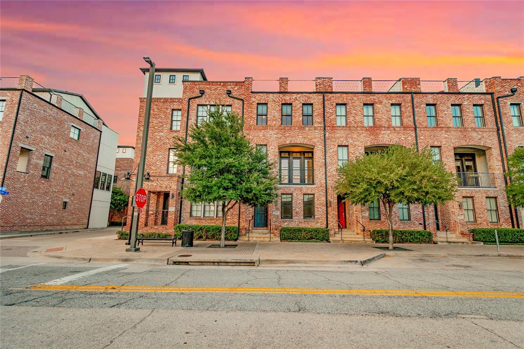 a view of a building with a street
