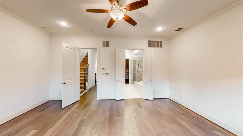 620 South Pearl Expressway Dallas, TX 75201 - Photo 17 of 33 wooden floor in an empty room with a window