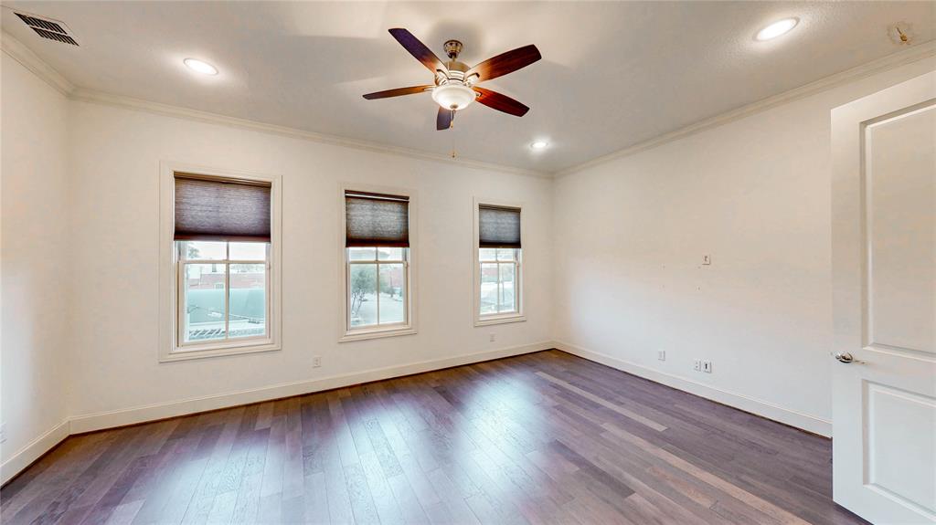 620 South Pearl Expressway Dallas, TX 75201 - Photo 18 of 33 a view of an empty room with wooden floor and a window