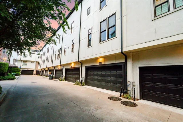 a view of a street with an outdoor space