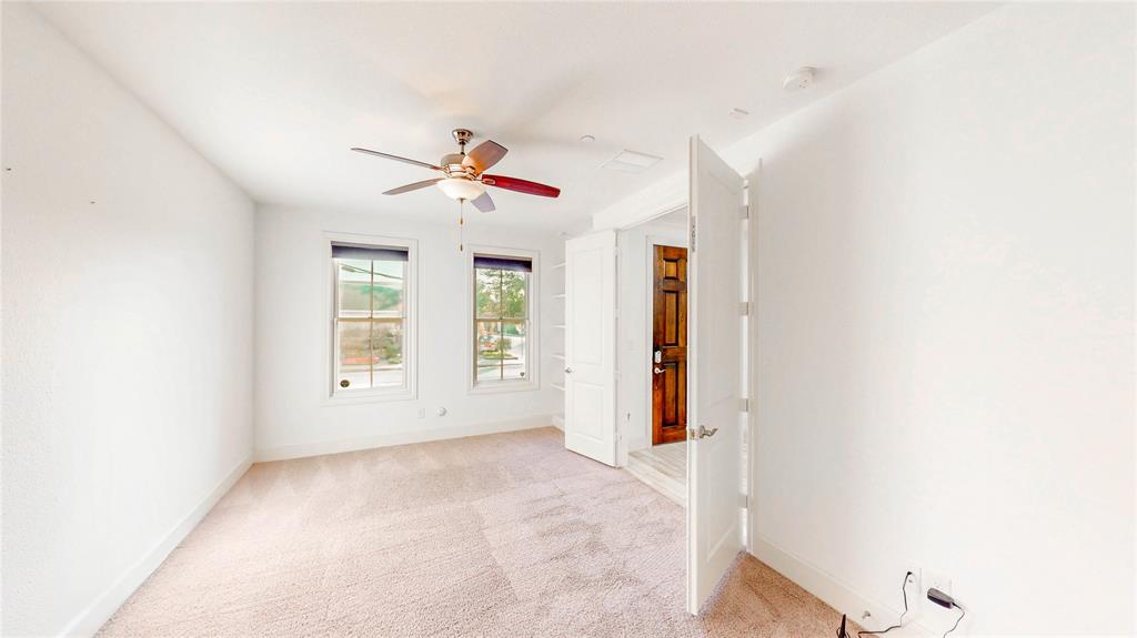 620 South Pearl Expressway Dallas, TX 75201 - Photo 6 of 33 a view of a livingroom with a ceiling fan and window