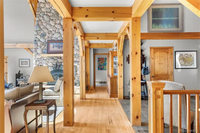 a bed room with a bed and a chair