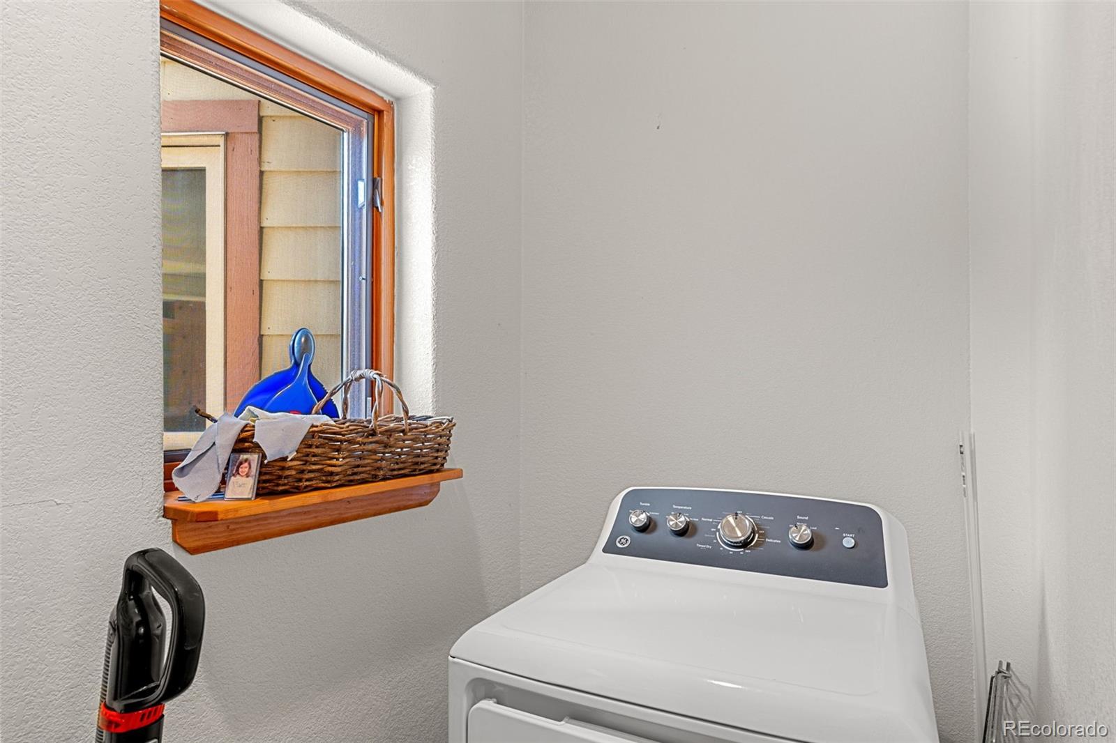 13445 Baird Road Conifer, CO 80433 - Photo 30 of 50 a utility room with dryer and washer