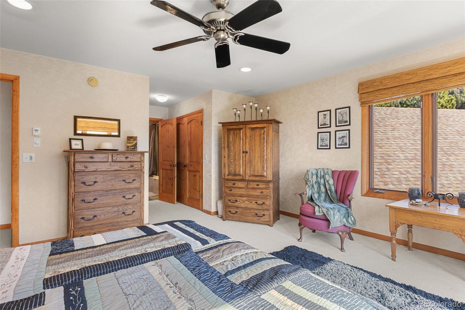 13445 Baird Road Conifer, CO 80433 - Photo 43 of 50 a living room with furniture and wooden floor