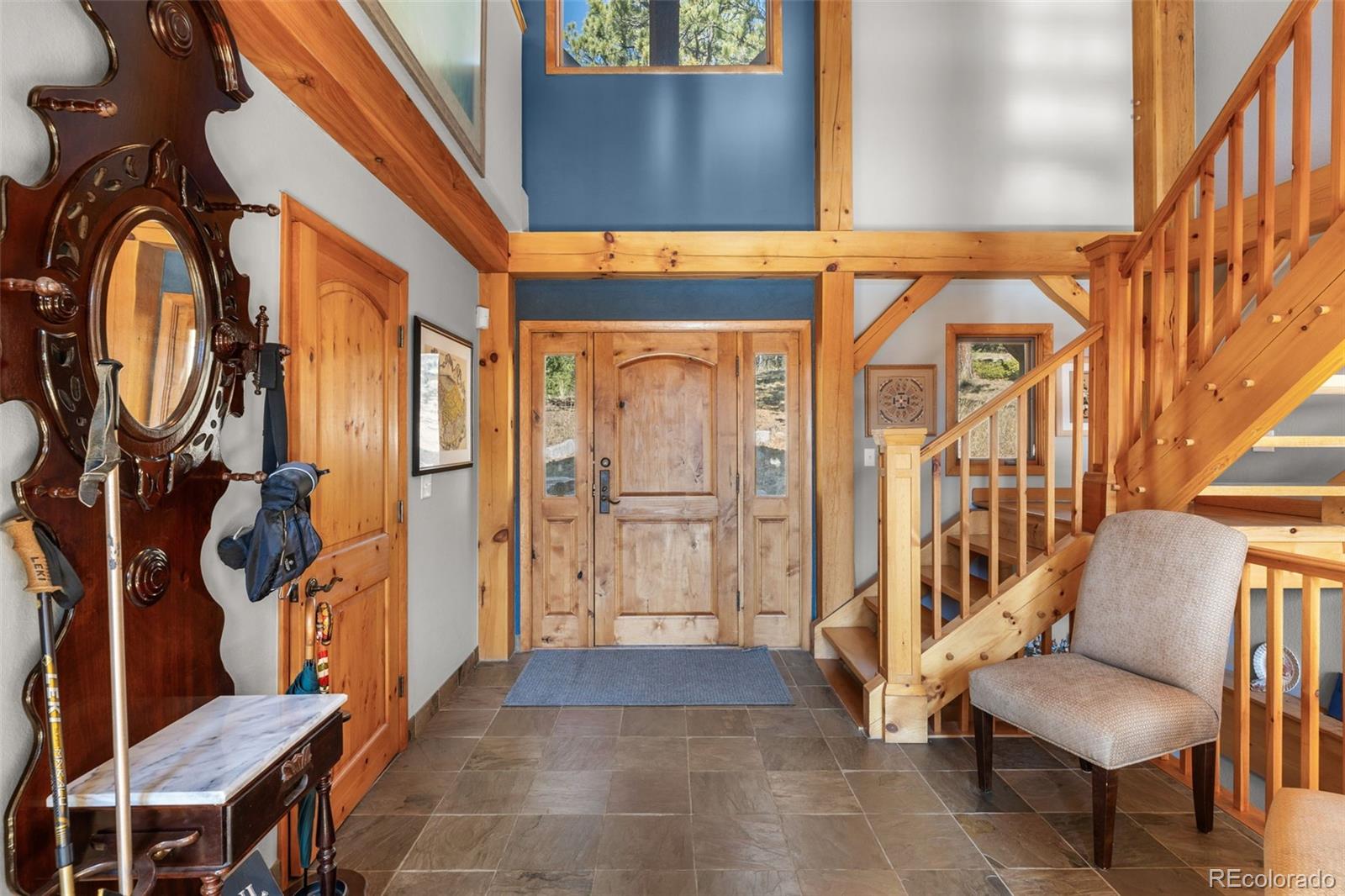 13445 Baird Road Conifer, CO 80433 - Photo 7 of 50 a view of an entryway with seating area