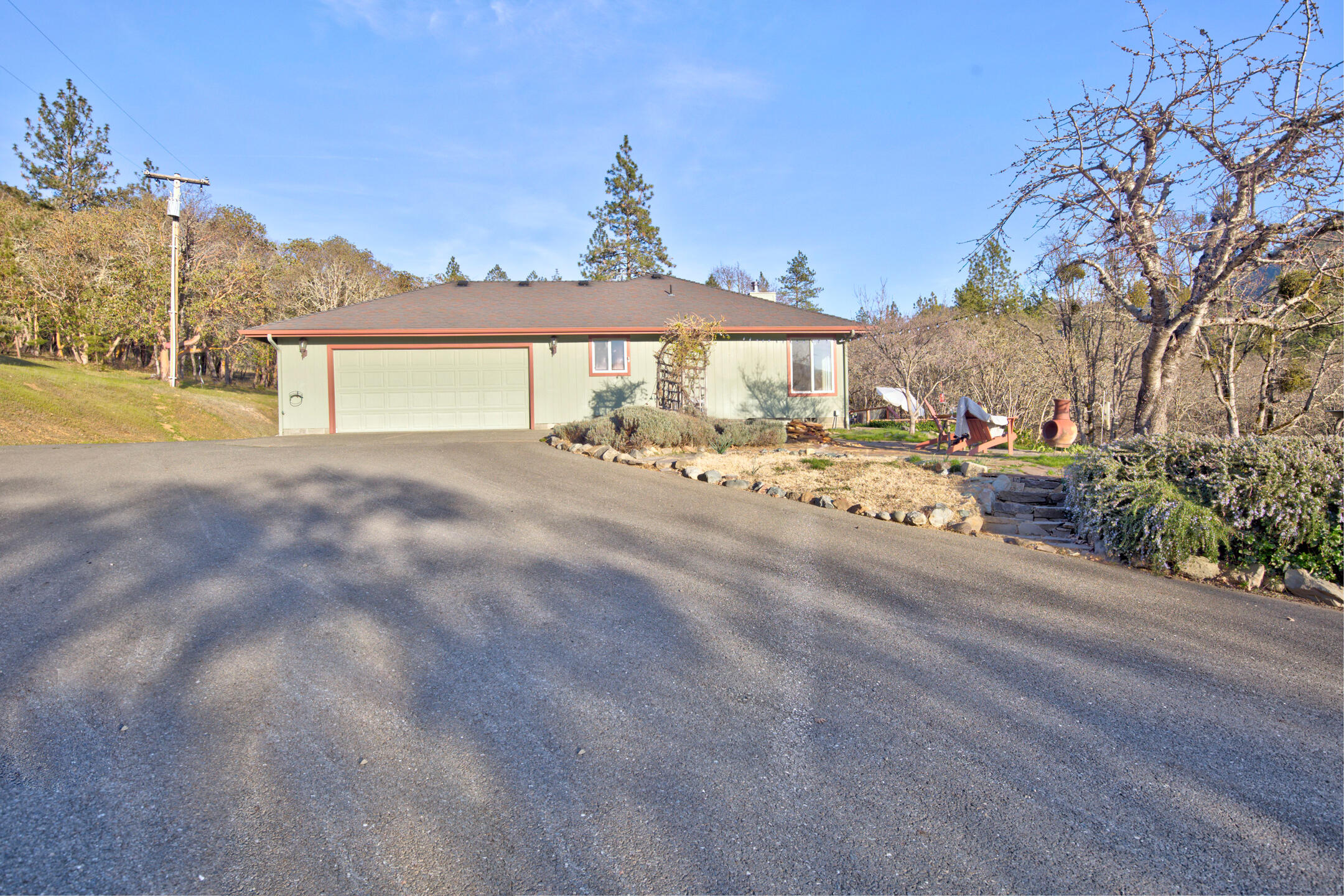 1440 Kubli Road Grants Pass, OR 97527 - Photo 53 of 56 a view of a house with a outdoor space