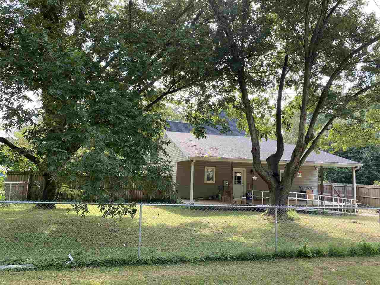113 Jordan Street Rutherford, TN 38369 - Photo 12 of 14 a view of a yard in front of a house with large trees