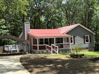 1145 Ridgeview Circle Macon, GA 31220 - Photo 1 of 1 a front view of a house with garden