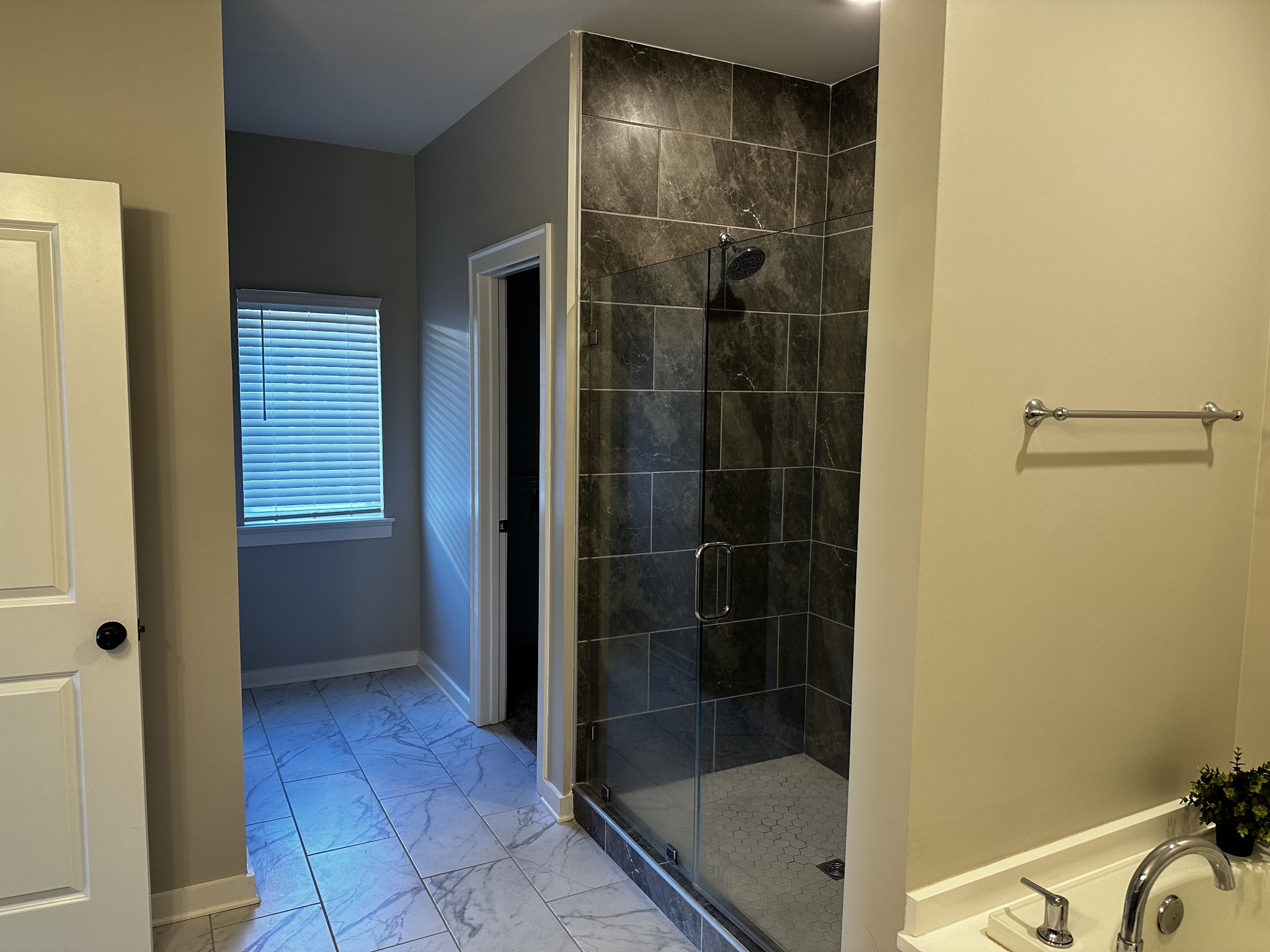 1065 Fallow Road Mount Juliet, TN 37122 - Photo 30 of 55 a bathroom with a glass shower door