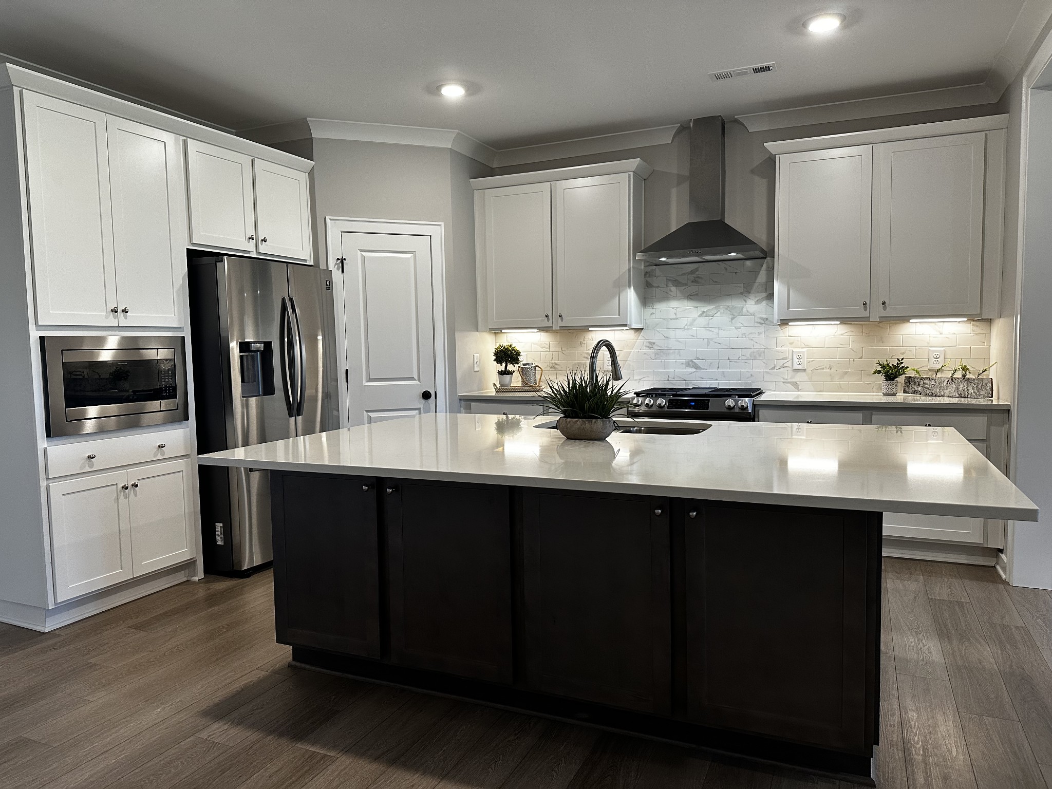 1065 Fallow Road Mount Juliet, TN 37122 - Photo 7 of 55 a kitchen with stainless steel appliances a sink a stove a refrigerator and cabinets
