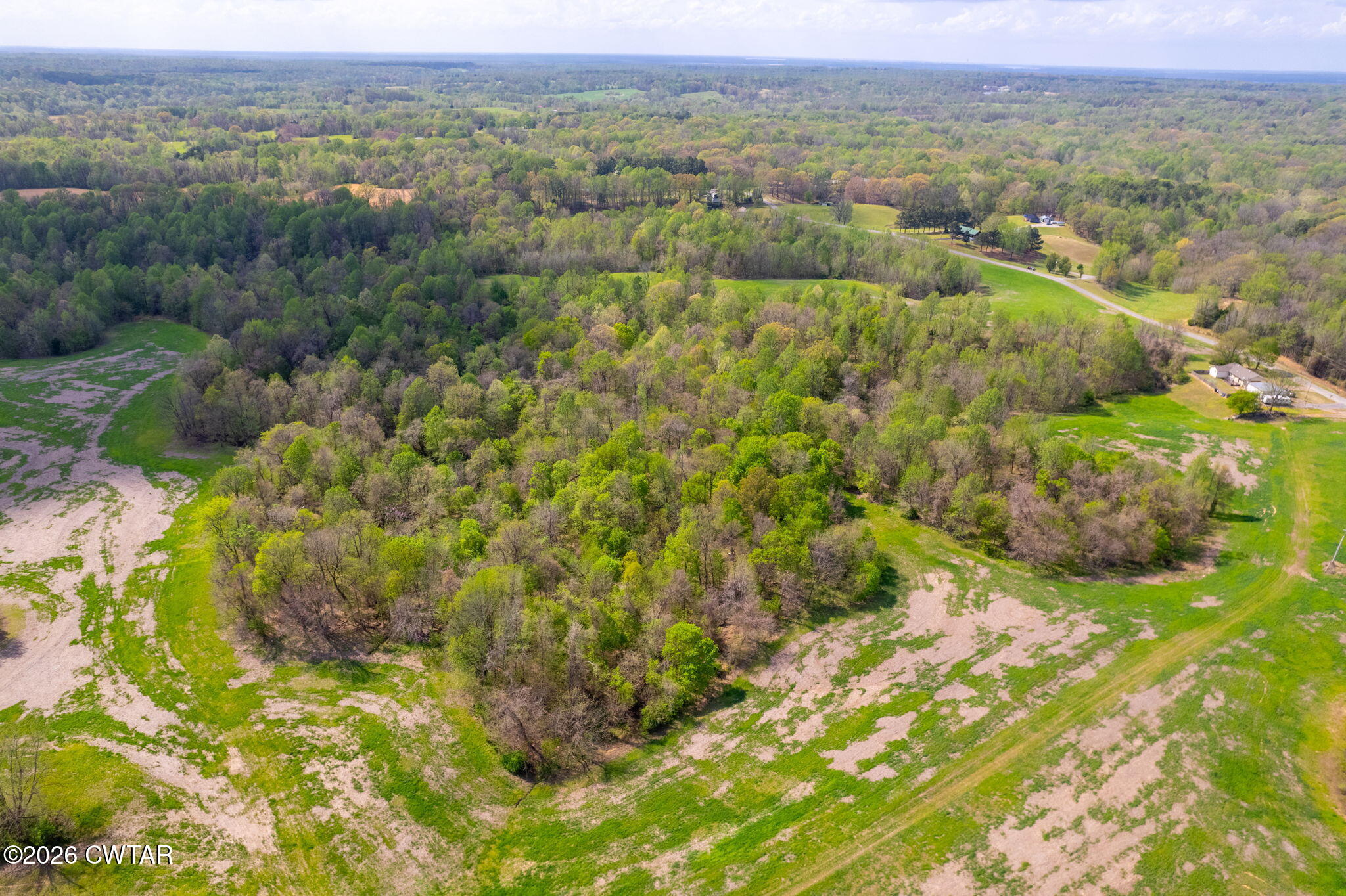 0 Bald Knob Road Ripley, TN 38063 - Photo 16 of 22 a view of a city with lush green forest