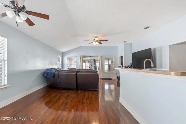 a bathroom with a sink vanity and a mirror