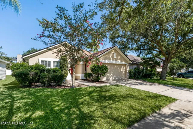 a living room with lots of furniture and a flat screen tv