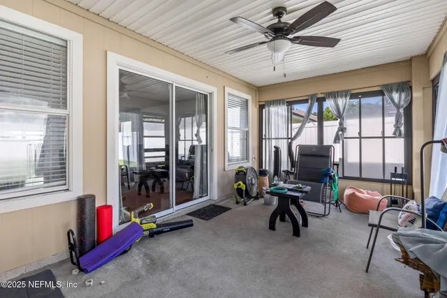 a kitchen with stainless steel appliances granite countertop wooden cabinets a stove a sink and dishwasher with wooden floor