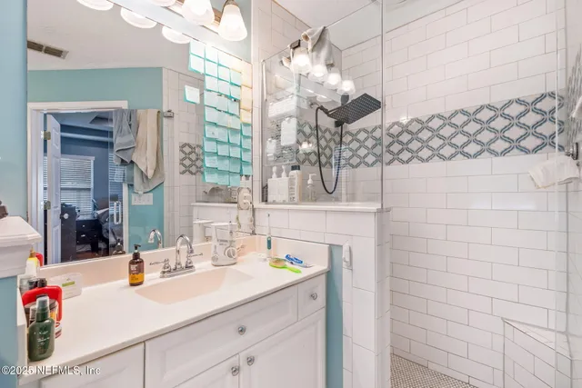 a kitchen with stainless steel appliances granite countertop a stove a sink dishwasher and a refrigerator