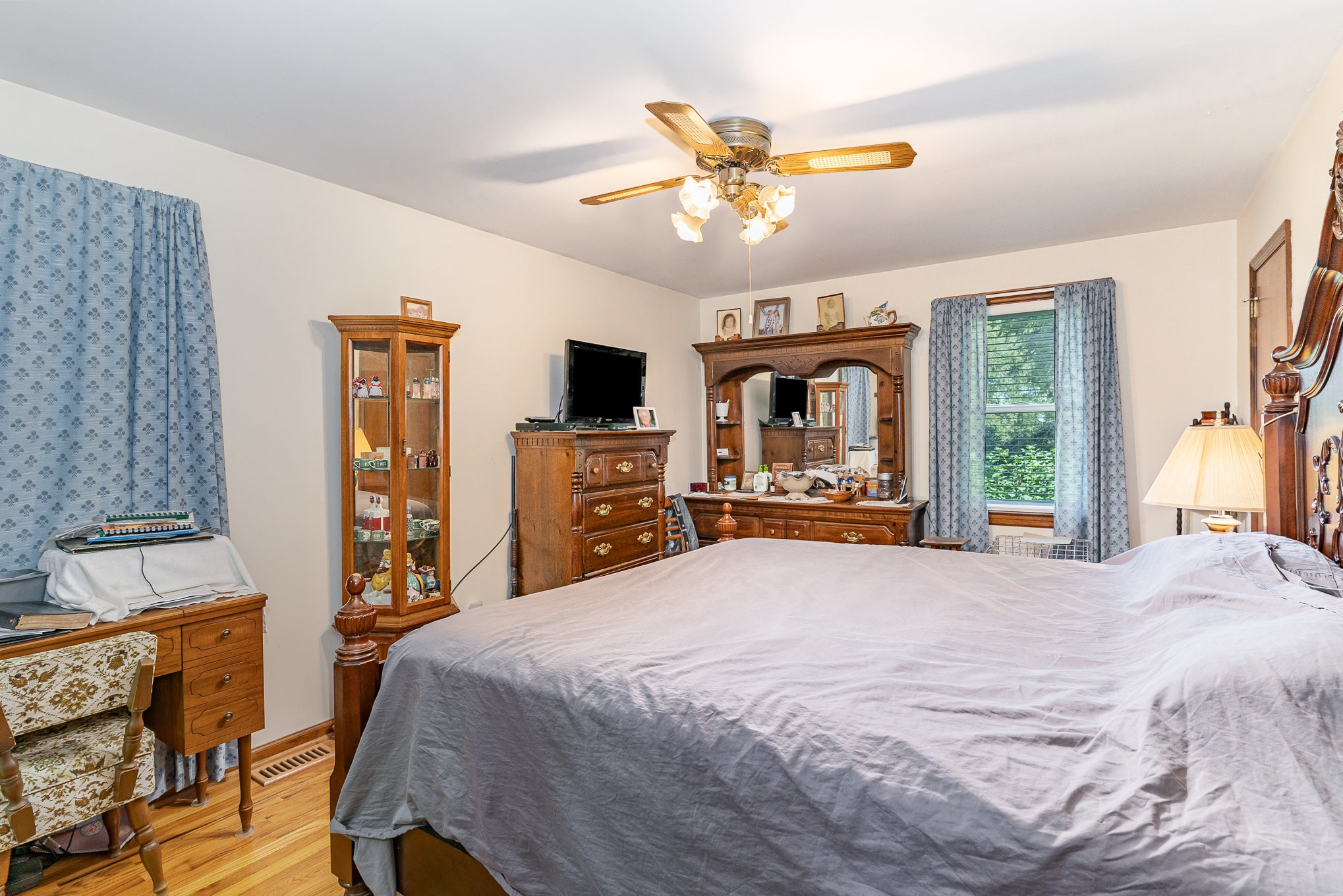 2847 Ashwood Road Columbia, TN 38401 - Photo 11 of 38 a bedroom with a large bed and a flat tv screen on dresser