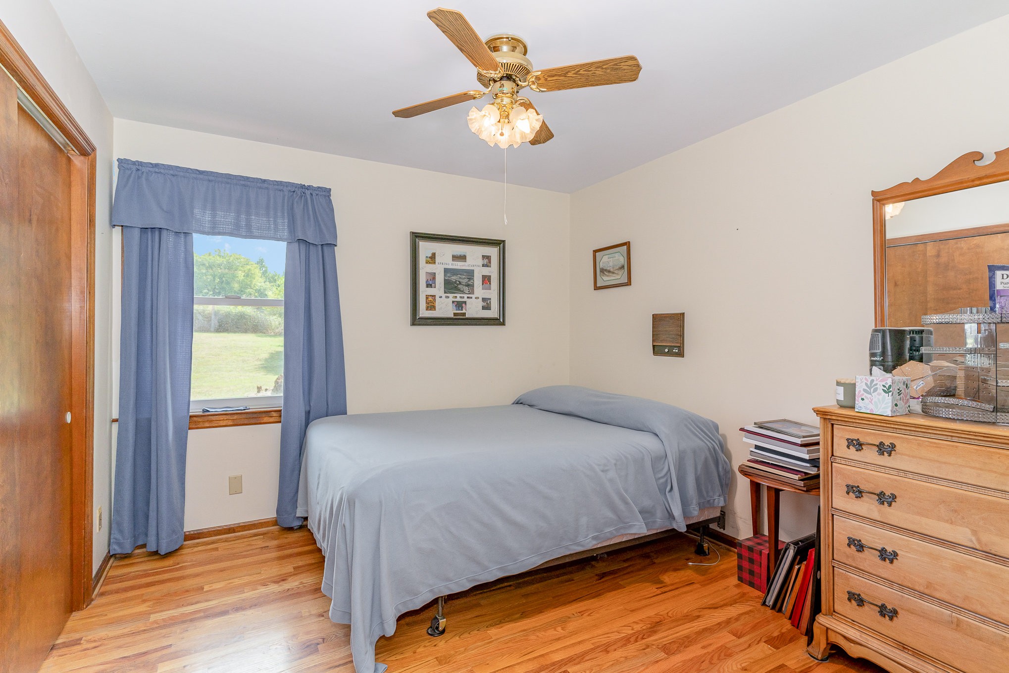 2847 Ashwood Road Columbia, TN 38401 - Photo 14 of 38 a bedroom with a bed and a dresser