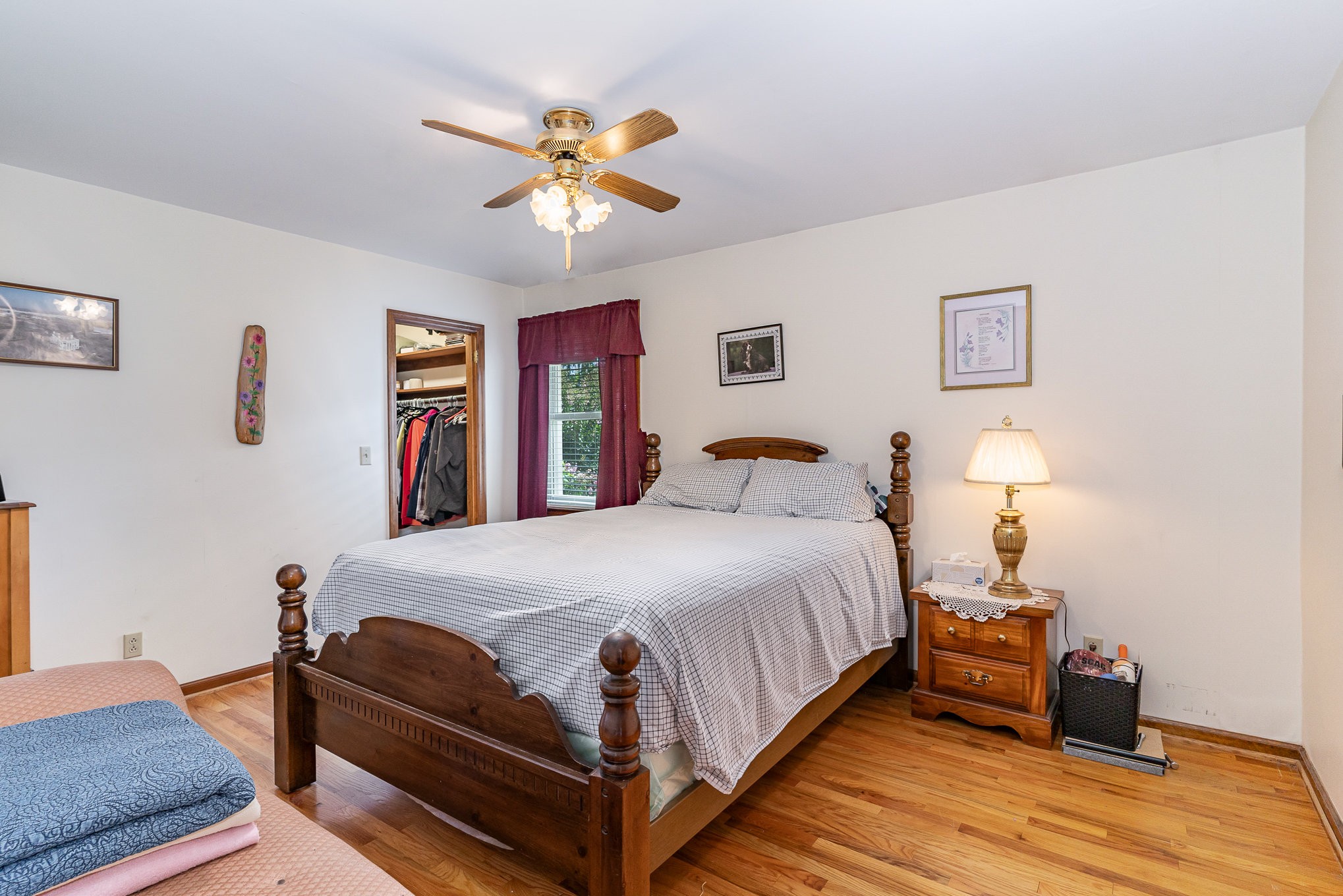 2847 Ashwood Road Columbia, TN 38401 - Photo 15 of 38 a bedroom with a bed and wooden floor