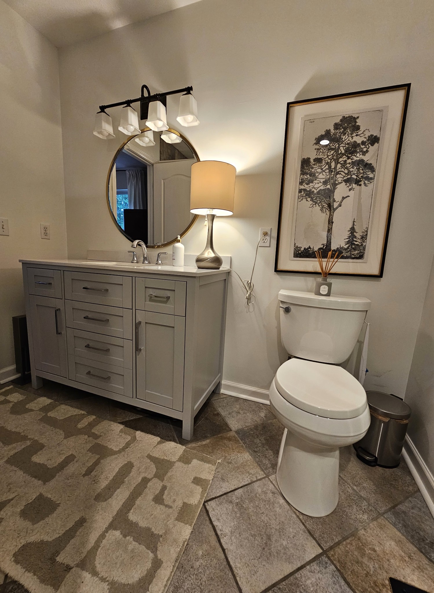 830 Bates Road Lebanon, TN 37087 - Photo 34 of 41 a bathroom with a toilet a sink and mirror