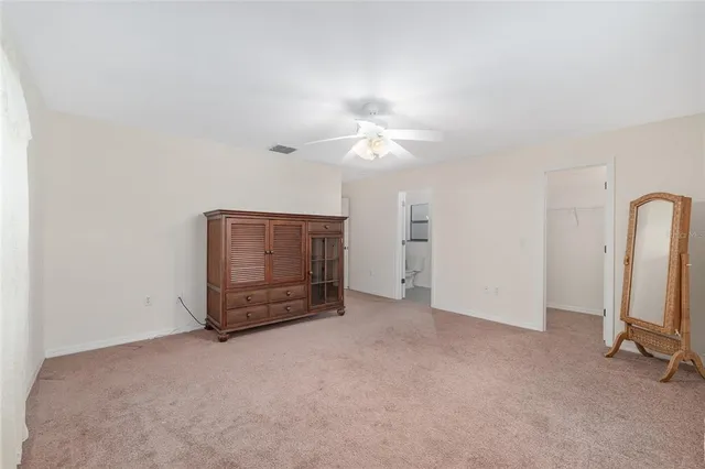 a view of a porch with a floor to ceiling window